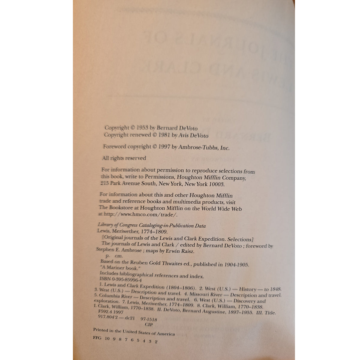A close-up of a book's copyright page showing printed text on a light beige paper background.