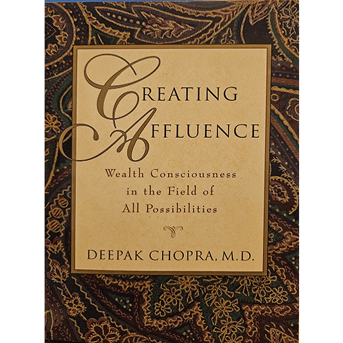 Cover of "Creating Affluence" by Deepak Chopra. The design features intricate paisley patterns framing a central beige box with the title in elegant fonts, offering a blend of spirituality and wealth wisdom.