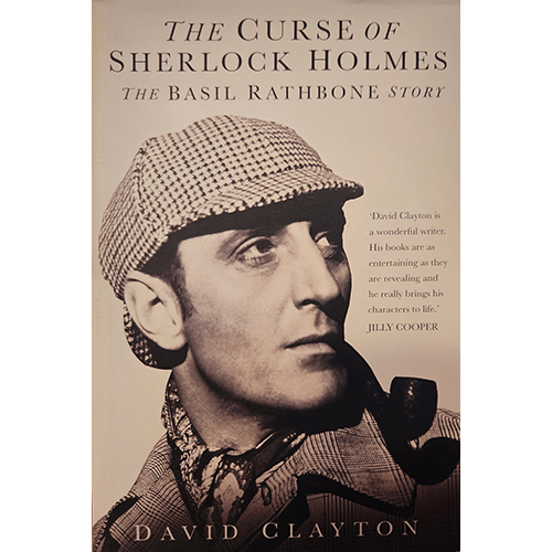  Cover of The Curse of Sherlock Holmes by David Clayton, featuring a black-and-white portrait of Basil Rathbone as Sherlock Holmes, wearing a deerstalker hat and smoking a pipe.