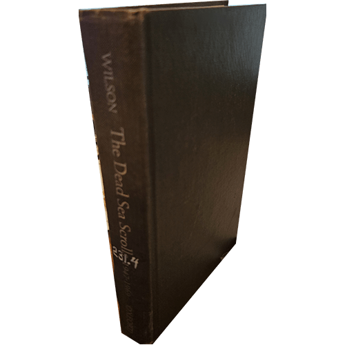 Spine view of The Dead Sea Scrolls 1947-1969 by Edmund Wilson. Hardcover in black, spine titled in silver text. A historical exploration of the Dead Sea Scrolls' discovery, interpretation, and significance.