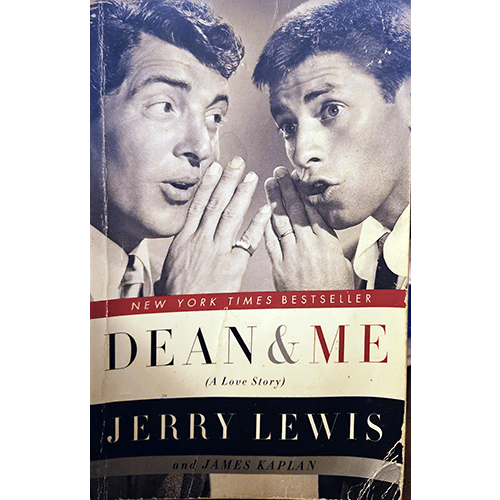 The cover of "Dean & Me (A Love Story)" by Jerry Lewis and James Kaplan features black-and-white photos of Dean Martin and Jerry Lewis, with Lewis whispering to Martin in a playful, iconic pose.