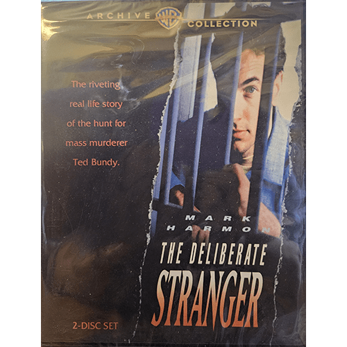 Cover of The Deliberate Stranger DVD, featuring Mark Harmon as Ted Bundy. Shows Harmon peering out through bars with a tense expression. The tagline reads, "The riveting real life story of the hunt for mass murderer Ted Bundy."