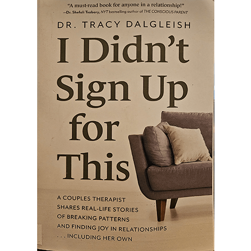  The book cover of "I Didn’t Sign Up for This" features a neutral-toned image of a modern, comfortable sofa with pillows, with the title and author’s name in large bold text, emphasizing relationship themes.