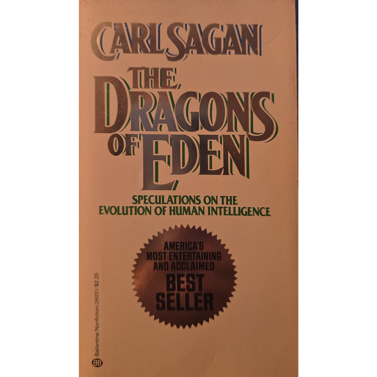 The front cover of the book 'The Dragons of Eden' by Carl Sagan, featuring a warm tan background with dark brown and green typography and a dark brown 'Best Seller' seal near the bottom.