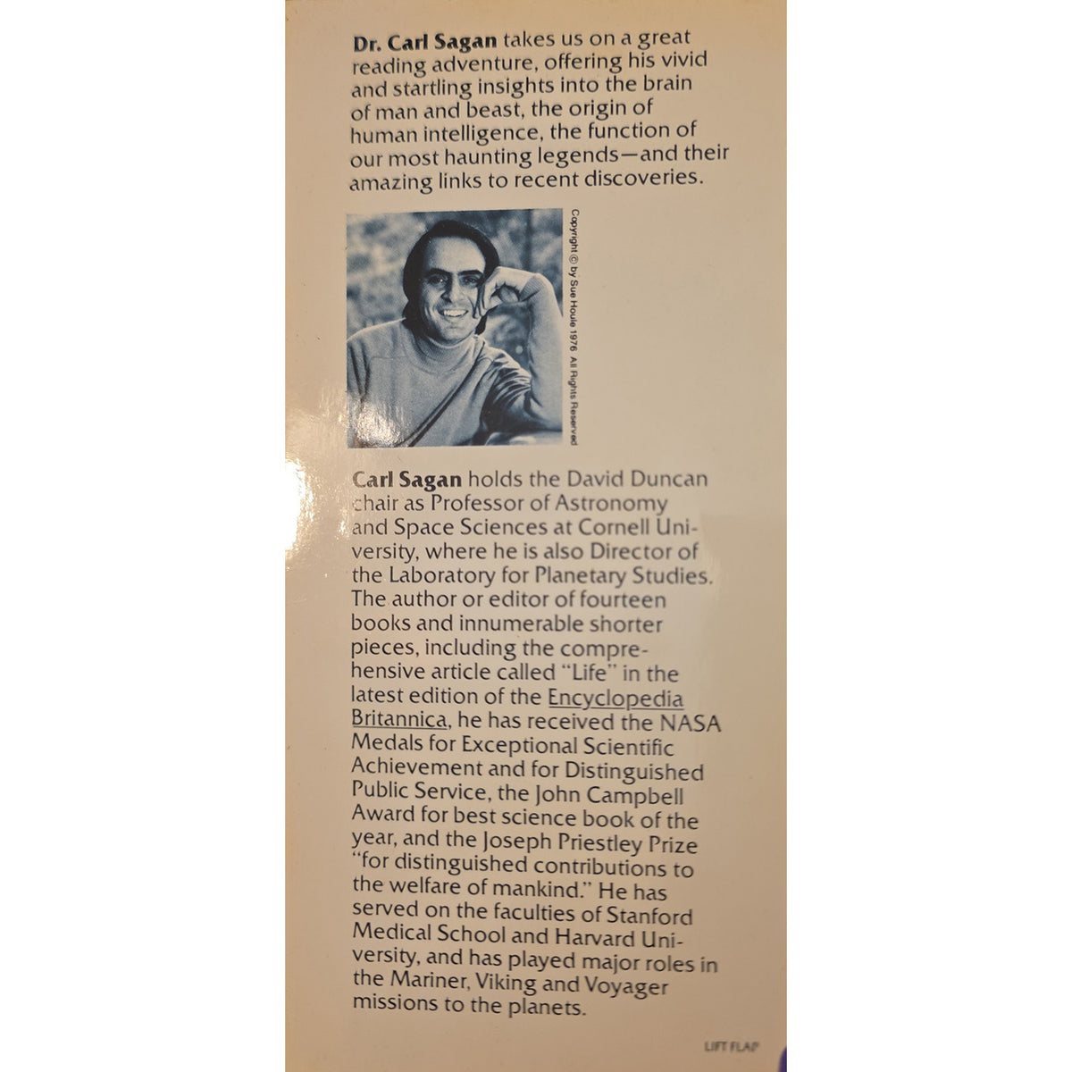 A vertical book flap with a warm beige background and black text, featuring a small black-and-white portrait of Carl Sagan near the top. The cover includes biographical text about Carl Sagan and a small 'LIFT FLAG' mark at the bottom right.