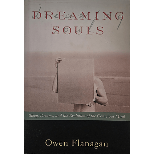 Cover of Dreaming Souls by Owen Flanagan, featuring a sepia-toned image of a person holding a mirror in front of their face, with red title text above and a black lower banner displaying the author’s name.