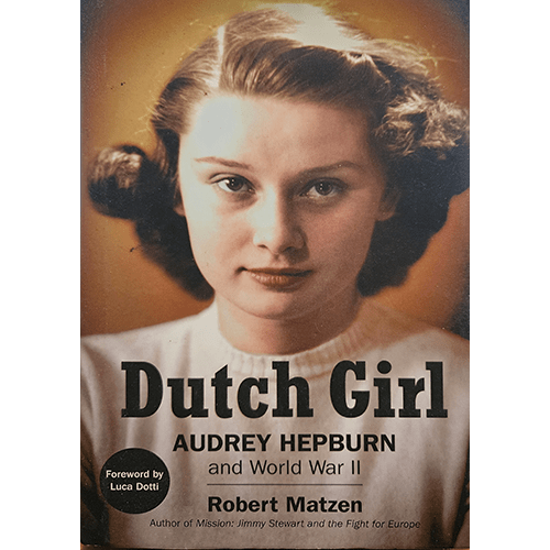 The cover of "Dutch Girl: Audrey Hepburn and World War II" by Robert Matzen features a young Audrey Hepburn with a solemn expression, set against a soft, sepia-toned background, highlighting her early life during WWII.