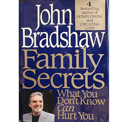 Cover of John Bradshaw's Family Secrets: What You Don't Know Can Hurt You, featuring a bold title in white text on a blue background, with a small photo of the author in the bottom left corner.