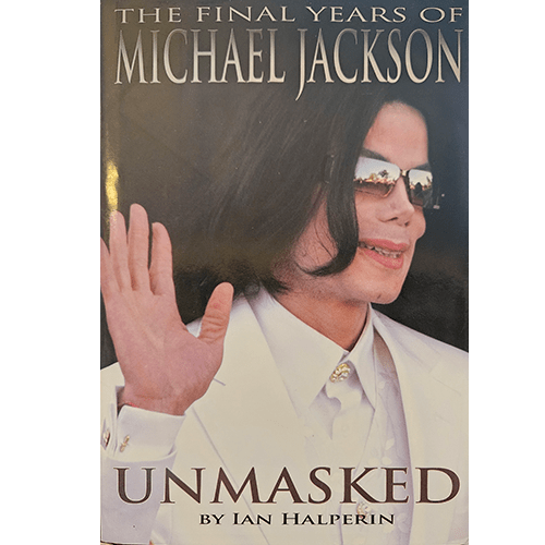 Cover of Unmasked: The Final Years of Michael Jackson by Ian Halperin featuring Michael Jackson waving in a white suit and sunglasses. Captures the enigmatic aura of the King of Pop.