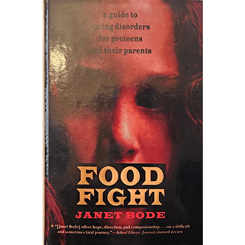 Cover of "Food Fight" by Janet Bode, featuring a close-up of a young girl's face with red tones, symbolizing the struggle with eating disorders.