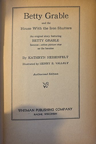 Title page of “Betty Grable and the House With the Iron Shutters” by Kathryn Heisenfelt, illustrated by Henry E. Vallely, authorized edition.