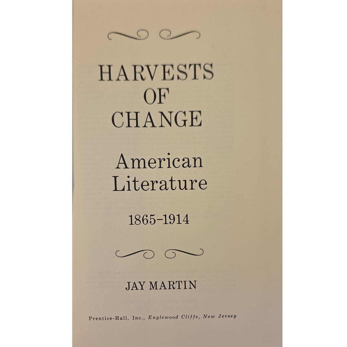 The front cover of the book 'Harvests of Change: American Literature 1865-1914' by Jay Martin, published by Prentice-Hall. The cover is a warm beige color with black serif text and decorative flourishes.
