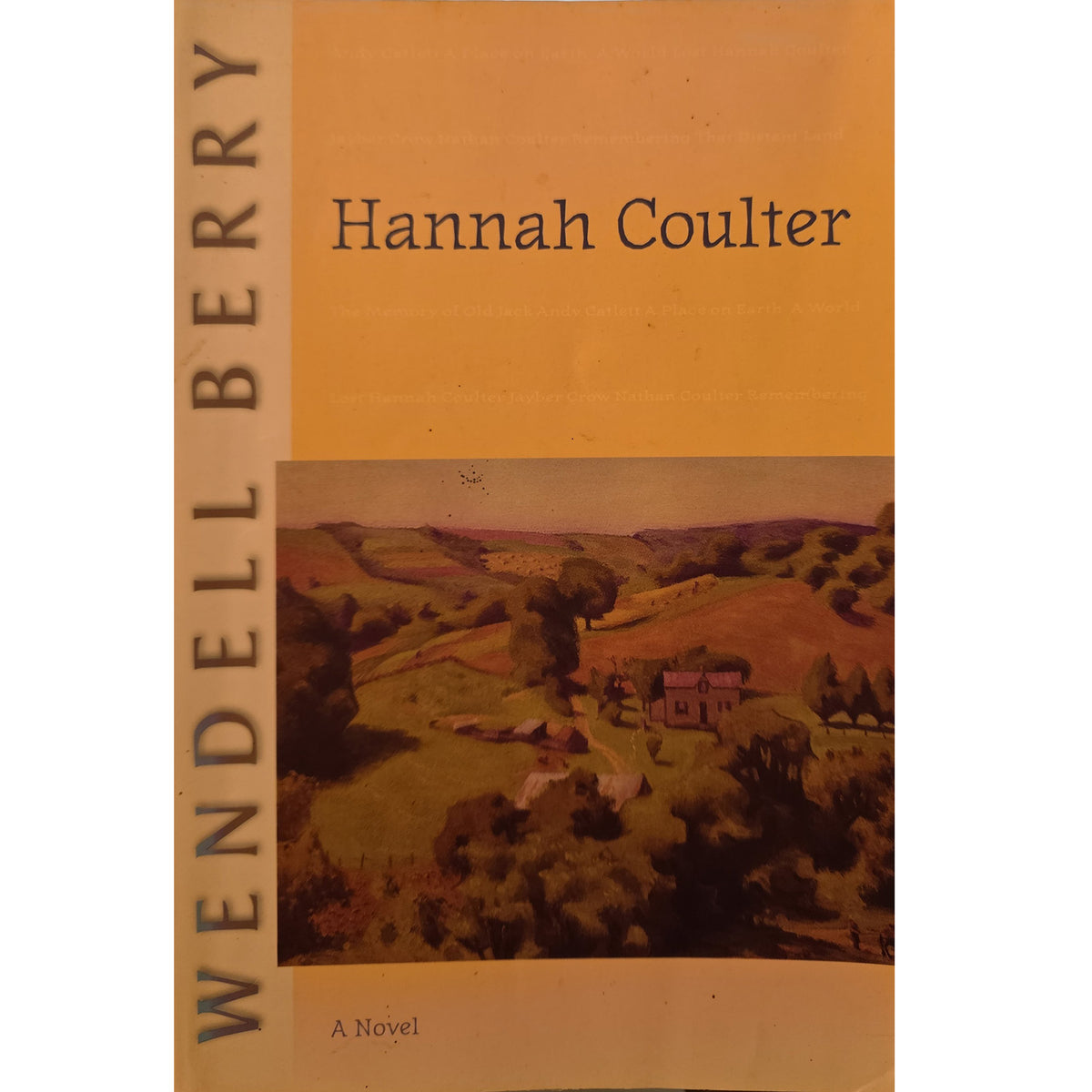 Book cover of 'Wendell Berry' by Hannah Coulter, featuring a warm orange-brown background with a landscape painting of rolling hills and a small house near the bottom.