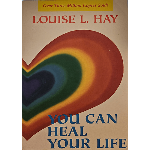 The cover of You Can Heal Your Life by Louise L. Hay features a colorful, layered heart design with vibrant red, orange, yellow, green, and blue tones, symbolizing love and healing.