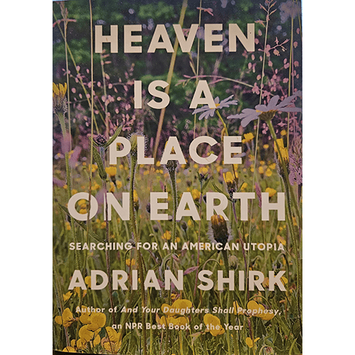 The cover of Heaven Is a Place on Earth by Adrian Shirk features a colorful field of wildflowers against a blurred background, with the title and author’s name prominently displayed in bold, white text.