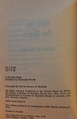 A close-up of a book's printed interior page showing publication details, including 'A Del Ray Book', 'Published by Ballantine Books', copyright information, ISBN numbers, and printing locations on aged beige paper.