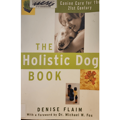 Cover of The Holistic Dog Book by Denise Flaim features a happy dog and its owner, along with images of natural remedies. The title is in large green text with a foreword by Dr. Michael W. Fox.