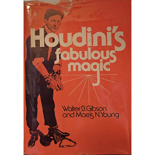 Red cover of Houdini's Fabulous Magic by Walter B. Gibson and Morris N. Young, featuring Houdini in handcuffs and chains. Title in bold white font with a vintage style, capturing Houdini's mystique.