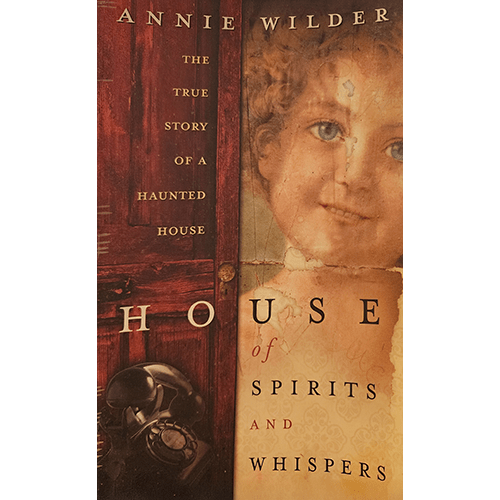 The cover of House of Spirits and Whispers by Annie Wilder features an eerie collage of a vintage doll’s face alongside dark, antique elements, hinting at the supernatural themes within the book.