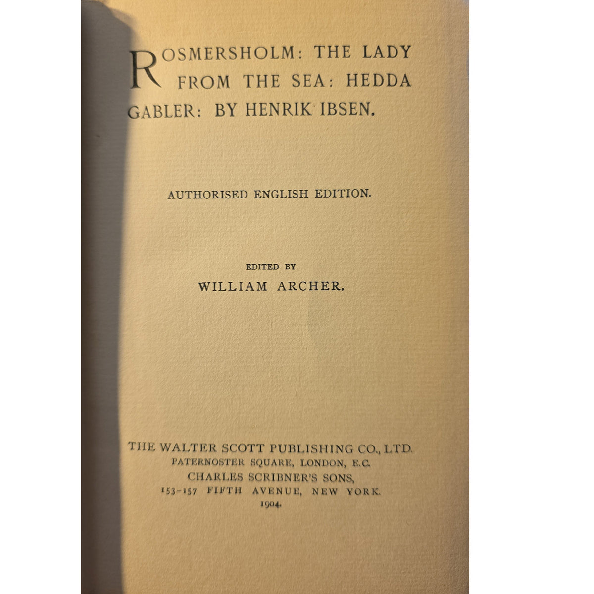 The front cover of a vintage book titled 'Rosmersholm: The Lady from the Sea: Hedda Gabler; by Henrik Ibsen. Authorised English Edition.