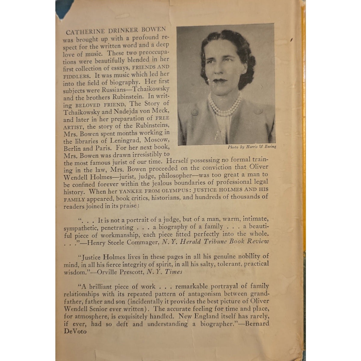 back cover of John adams. The text is black on warm off-white paper, and the book pages are bound with a gold-toned spine edge visible on the right.