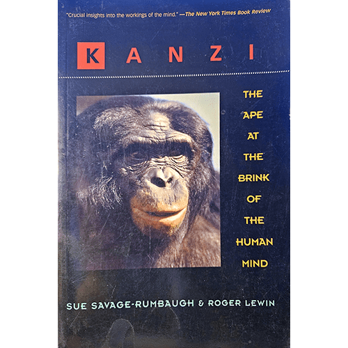 The cover of Kanzi: The Ape at the Brink of the Human Mind by Sue Savage-Rumbaugh and Roger Lewin features a close-up of Kanzi, a bonobo, with the title in bold, highlighting his pivotal role in scientific research.