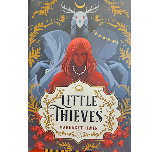 The cover of Little Thieves by Margaret Owen features a striking red-haired woman in a red dress with two shadowy figures behind her. Golden vines frame the title, creating a mysterious and magical feel.