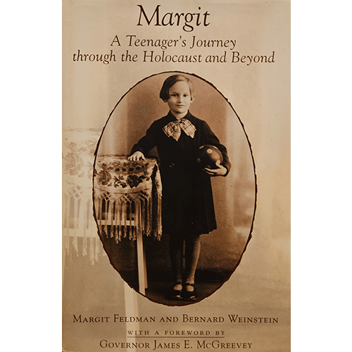 The book cover features a sepia-toned image of young Margit Feldman, a Holocaust survivor, standing next to a table with a traditional lace cloth, symbolizing her innocence before the atrocities of war.