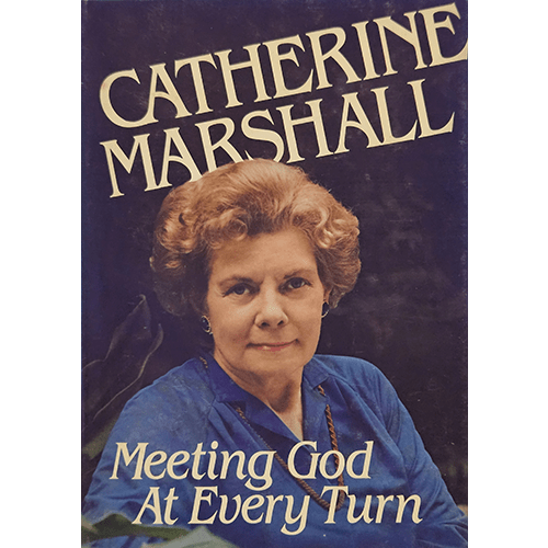 The cover of "Meeting God at Every Turn" features a serene landscape with a winding path leading towards a golden horizon. The sky is painted in warm hues of orange and pink, symbolizing hope and divine presence. The title is elegantly written in a soft, cursive font, evoking a sense of peace and reflection.