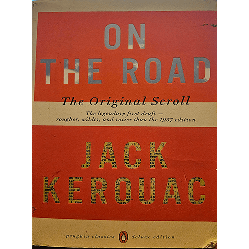 The cover of "On the Road: The Original Scroll" by Jack Kerouac, Penguin Classics Deluxe Edition, features a distressed red background with bold, faded text. The title and author's name are prominently displayed, evoking a vintage, rugged feel, reminiscent of the novel's raw, unedited manuscript.