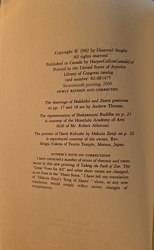 A photographed page of printed text on aged off-white paper, likely a book or publication copyright page, with black typewriter-style text and a warm yellowed paper tone.