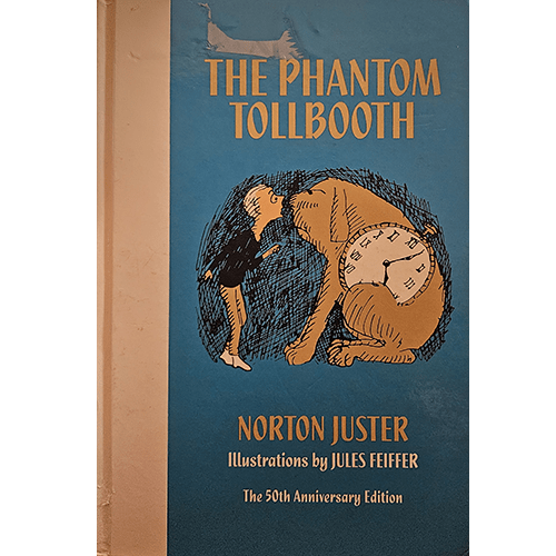 Cover of The Phantom Tollbooth 50th Anniversary Edition by Norton Juster, illustrated by Jules Feiffer. Features Milo and the watchdog Tock, sitting next to a large clock, against a blue background.