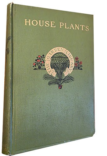 Oblique view of House Plants and How to Grow Them showing original green cloth binding and gilt spine lettering from 1909.