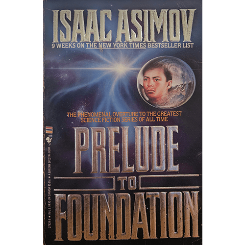 Cover of "Prelude to Foundation" by Isaac Asimov, featuring a cosmic background, a man's face within a planetary sphere, and bold gold text highlighting the title and author.