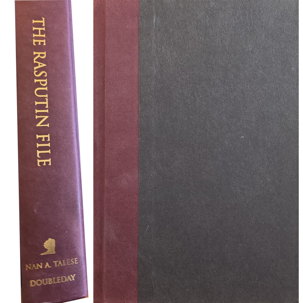 spine and cover of the rasputin file. burgandy and black boards