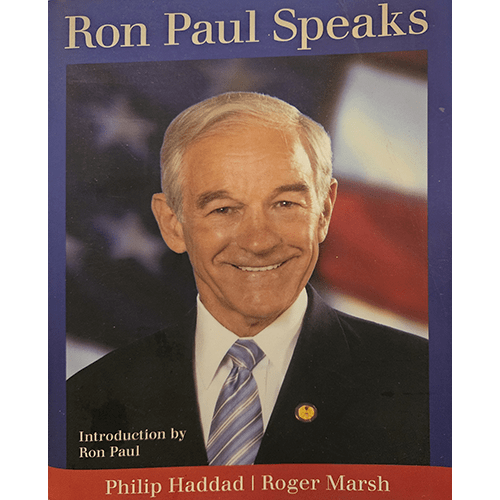 Cover of Ron Paul Speaks, showing Ron Paul smiling against a blurred American flag background. Book by Philip Haddad and Roger Marsh with an introduction by Ron Paul on freedom and government.