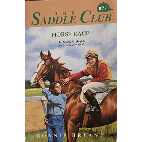 Cover of The Saddle Club #70: Horse Race shows two girls with a horse and a jockey. One girl holds the horse’s reins while the jockey smiles, preparing for the race. The background shows a racetrack.