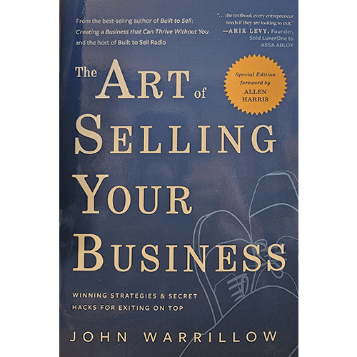 Cover of The Art of Selling Your Business by John Warrillow. Features blue tones with a clean design, shoes representing an exit strategy, and bold title typography. Includes a special edition note.