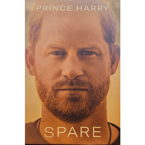 The cover of Spare by Prince Harry features a close-up portrait of the Duke of Sussex, with a serious expression that reflects the memoir's introspective and candid nature.