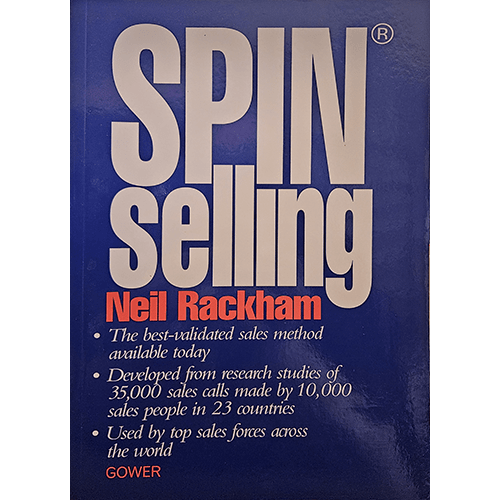 The cover of SPIN Selling by Neil Rackham features bold white text on a blue background, emphasizing the title and author. It also highlights key selling points for its proven sales methods.