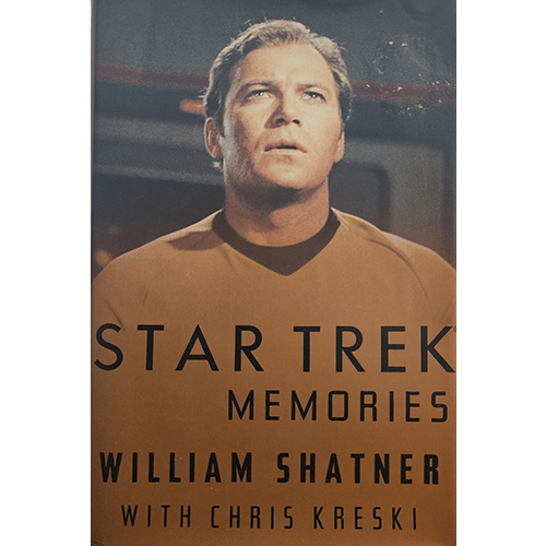 Cover of Star Trek Memories by William Shatner with Chris Kreski. The image shows William Shatner as Captain Kirk in his classic Star Trek uniform, with a contemplative expression in a spaceship setting.