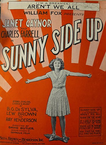Vintage movie poster for 'Sunny Side Up' featuring Janet Gaynor and Charles Farrell.