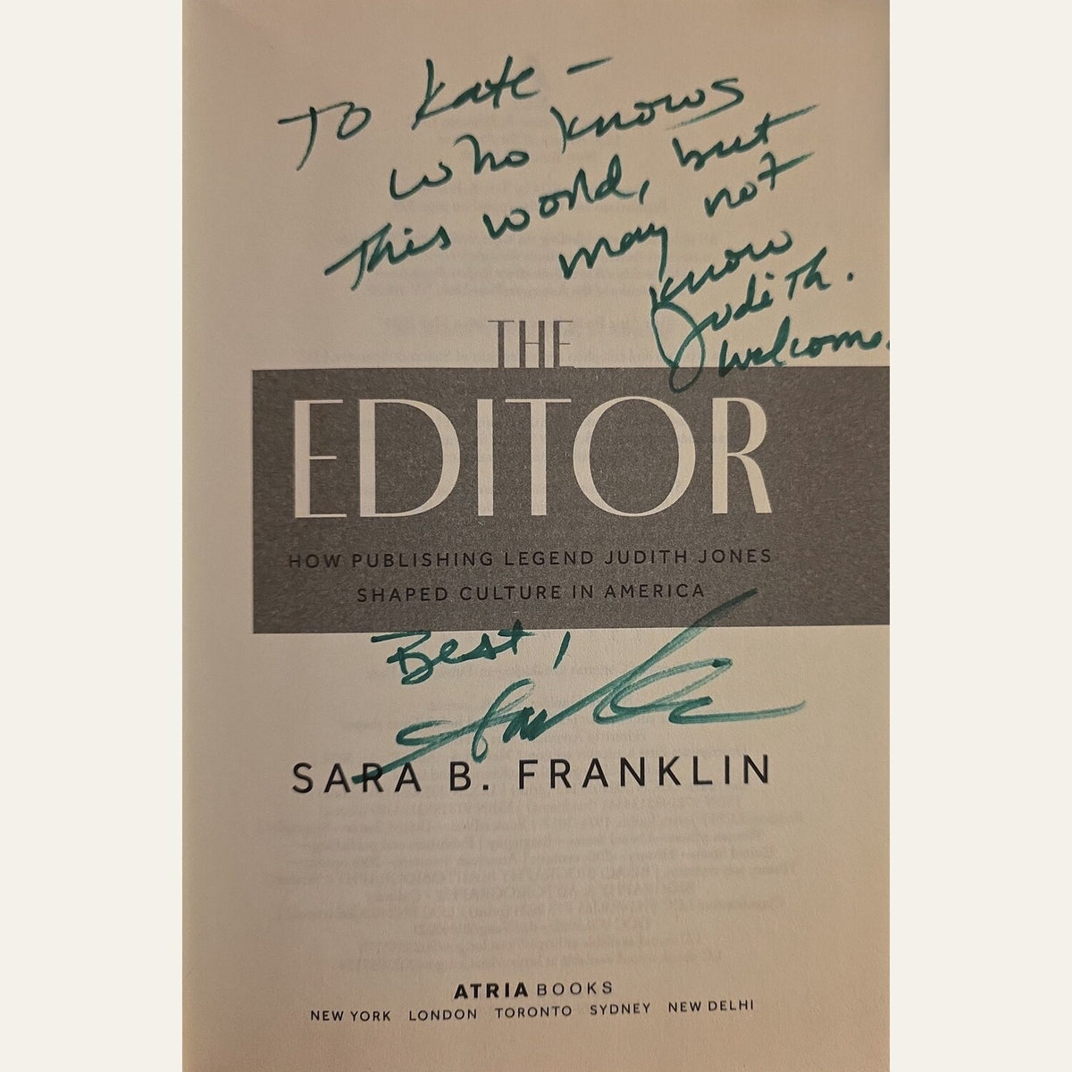 The front cover of the signed book 'The Editor' by Sara B. Franklin, featuring a beige background with a dark gray title block and green handwritten autographs.