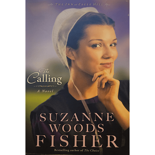 The cover of The Calling by Suzanne Woods Fisher features a young Amish woman, Bethany Schrock, thoughtfully posed with a serene smile, set against a peaceful countryside background, wearing a white bonnet and dark dress.