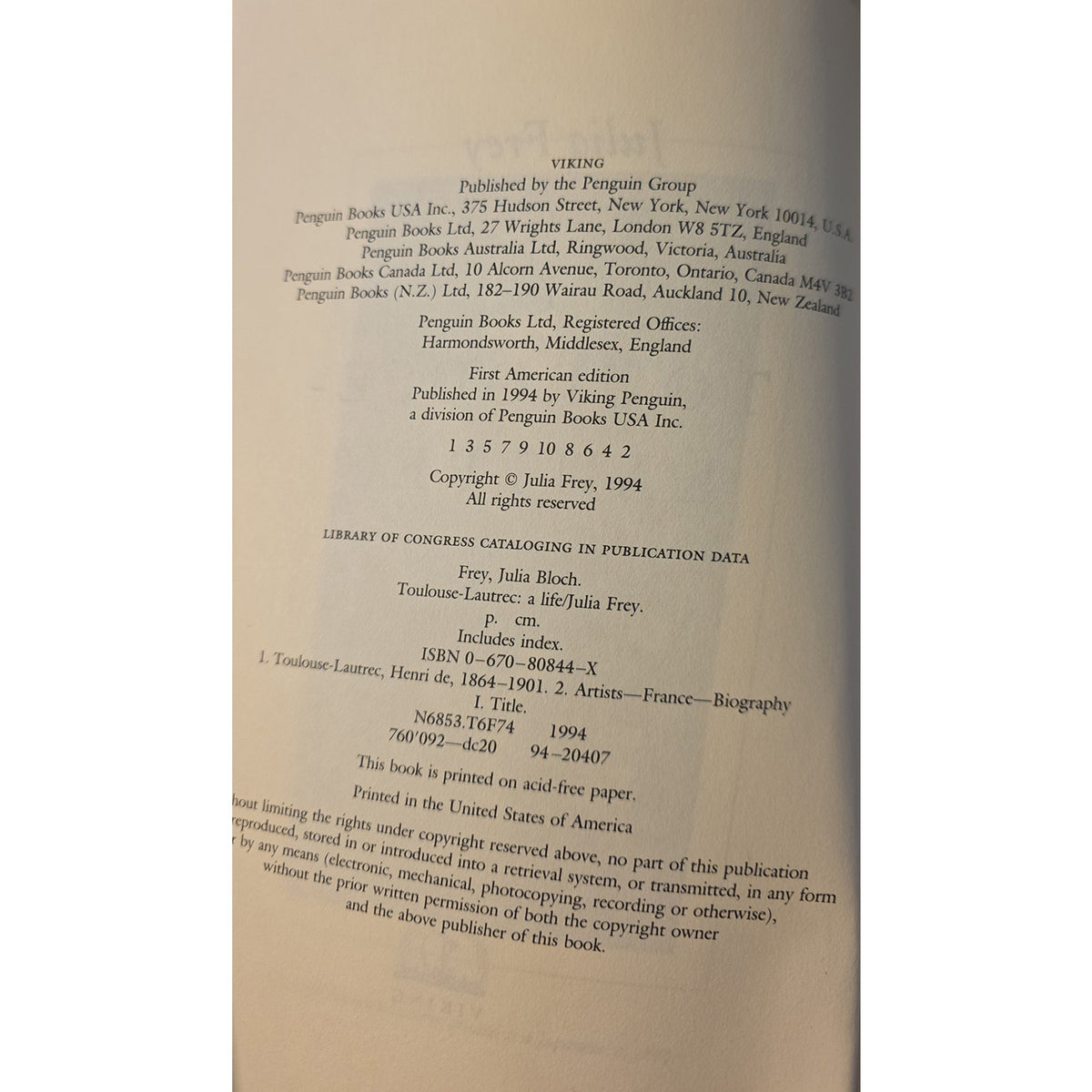 A close-up of a book's printed copyright page, showing publisher details for Viking and Penguin Books in multiple languages, with the left page slightly offset against a white background.