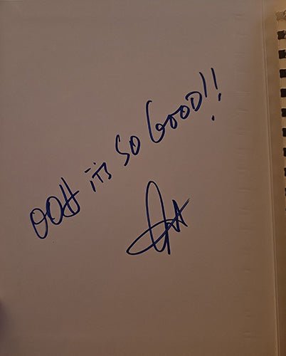 Signed interior page with handwritten “Ooh it’s so good!!” by Art Ginsburg