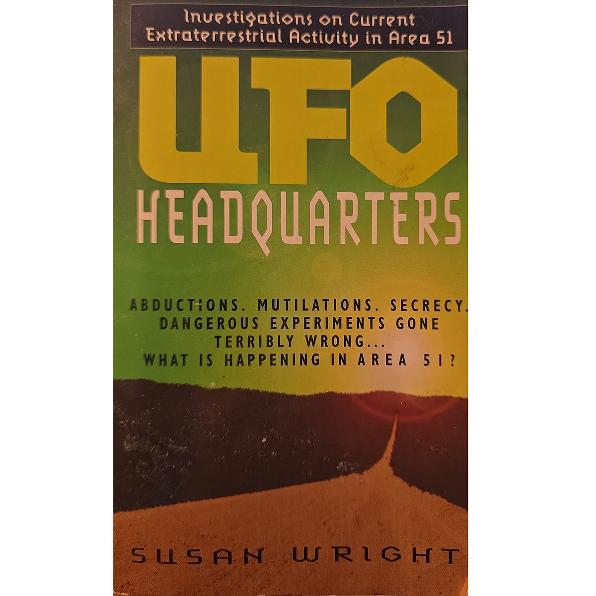 Book cover for 'UFO Headquarters' by Susan Wright, featuring large yellow 'UFO' lettering over a green-to-brown gradient background with black and beige text.