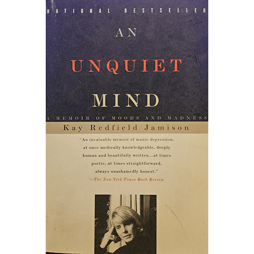 Cover image of An Unquiet Mind: A Memoir of Moods and Madness by Kay Redfield Jamison. The cover features a black and beige design with red title text and a photo of the author, highlighting its bestseller status.