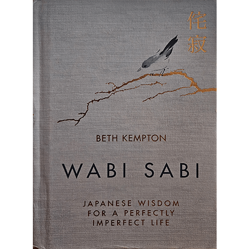 Cover of Wabi Sabi: Japanese Wisdom for a Perfectly Imperfect Life by Beth Kempton. Features a minimalist bird illustration on a textured, earthy background, reflecting themes of simplicity and beauty.