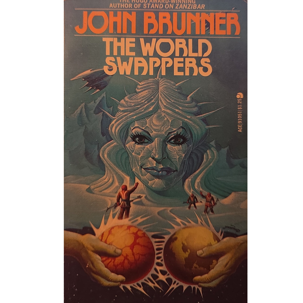 Book cover for 'The World Swappers' by John Brunner, featuring a stylized illustration of a large female face with flowing hair above two hands holding cracked orange and brown planets, with the title in large orange text at the top.